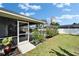 The backyard is complete with a landscaped perimeter at 7402 Gunstock Dr, Lakeland, FL 33809