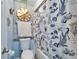 Charming bathroom with a unique nautical themed shower curtain at 7402 Gunstock Dr, Lakeland, FL 33809