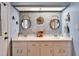 Bright bathroom with double sinks, stylish mirrors, and ample counter space at 7402 Gunstock Dr, Lakeland, FL 33809