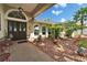 Charming front entrance featuring decorative accents, double doors, and well-maintained landscaping at 7402 Gunstock Dr, Lakeland, FL 33809