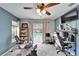 Versatile room offers exercise equipment, with view of the backyard pool at 7402 Gunstock Dr, Lakeland, FL 33809