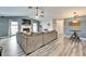 Spacious living room featuring a fireplace, comfortable seating, and stylish flooring at 7402 Gunstock Dr, Lakeland, FL 33809