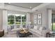 Spacious living room with modern decor and comfortable seating at 8953 Wildlight Trl, Wildwood, FL 34785