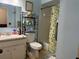 Bathroom featuring a vanity, toilet, and shower with a lemon-themed curtain, and neutral paint at 231 Connie Lee Ct, Lakeland, FL 33809