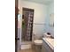 Bathroom featuring tiled shower, white toilet, and marble patterned sink counter at 231 Connie Lee Ct, Lakeland, FL 33809
