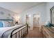 Cozy bedroom with view to en-suite bathroom and walk-in closet at 1022 Brimstone Cir, Winter Haven, FL 33884