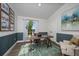 Well-lit home office featuring a large desk, modern decor and an accent wall at 1022 Brimstone Cir, Winter Haven, FL 33884