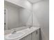 Bright bathroom featuring a double sink vanity with modern fixtures and ample counter space at 1616 Ellesmere Ave, Haines City, FL 33844
