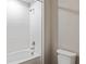 Bathroom featuring a bathtub shower combo and a toilet at 1616 Ellesmere Ave, Haines City, FL 33844