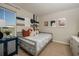 Cozy bedroom featuring a comfortable bed and baseball-themed decorations at 2004 Marigold Aly, Winter Haven, FL 33884