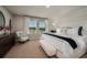 Serene main bedroom with a view of the lake, creating a peaceful retreat at 2004 Marigold Aly, Winter Haven, FL 33884