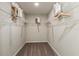 Walk-in closet includes wire shelving for storage with carpeted flooring at 2212 Canyon Oak Dr, Davenport, FL 33837