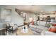 Open-concept living room that connects seamlessly to kitchen and dining areas, creating perfect entertainment space at 2212 Canyon Oak Dr, Davenport, FL 33837
