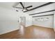 Spacious living room showcasing wood floors, beamed ceilings, and a bright, airy feel at 930 29Th Nw St, Winter Haven, FL 33881