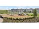 Community playground with modern climbing and sliding features and a soft landing at 3317 Armstrong Ave, Clermont, FL 34714