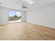Room with wood floors and lots of natural light and a sliding glass door at 438 Cotswold Cir, Davenport, FL 33837