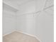 Walk-in closet provides organized storage with installed shelving at 438 Cotswold Cir, Davenport, FL 33837