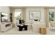 Cozy living room featuring a comfortable sofa, stylish decor, and natural light at 1311 Blue Ash Ln, Deland, FL 32720