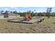 An expansive community park with playground, pavilion, and seating, designed for leisure and recreation at 1366 Blue Ash Ln, Deland, FL 32720