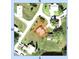Aerial view of the property showing the surrounding landscaping at 25322 Columbia Cir, Lake Wales, FL 33898