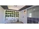 Inviting entrance featuring potted plants on the wall and a small table with chairs at 25322 Columbia Cir, Lake Wales, FL 33898