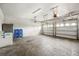 Spacious garage with two bays, garage door openers, and storage at 2846 Sera Bella Way, Kissimmee, FL 34744