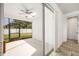 Screened in sunroom with fan overlooking the fenced backyard at 2846 Sera Bella Way, Kissimmee, FL 34744
