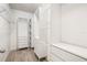 Walk-in closet with custom shelving providing storage at 2846 Sera Bella Way, Kissimmee, FL 34744