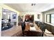 Large dining room with views into living room and large format tile floors throughout at 1464 Mount Pleasant Rd, Groveland, FL 34736