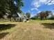 Charming single story home on a large lot with mature trees and lush green lawn at 1464 Mount Pleasant Rd, Groveland, FL 34736