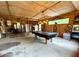 Spacious game room equipped with a pool table and bar area, ideal for entertaining guests and recreation at 1464 Mount Pleasant Rd, Groveland, FL 34736