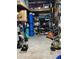Functional storage room with shelving, various storage containers, and essential household tools at 1464 Mount Pleasant Rd, Groveland, FL 34736