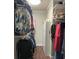 Walk-in closet with shelving and hanging storage, providing ample space at 1464 Mount Pleasant Rd, Groveland, FL 34736
