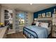Stylish bedroom featuring space-themed decor and a comfortable bed at 3856 King Hill Dr, Haines City, FL 33844