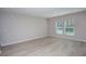 Inviting living area with sleek floors and plenty of natural light, perfect for relaxation and entertaining at 4043 Gardenia Ave, Lake Hamilton, FL 33851