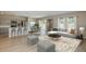 Open-concept living room features stylish furniture, modern decor, and plenty of natural light at 4075 Gardenia Ave, Lake Hamilton, FL 33851
