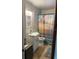 Bathroom with toilet, shower and sink at 617 Vandenberg St, Altamonte Springs, FL 32701