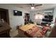 Bedroom with ceiling fan, television and window at 617 Vandenberg St, Altamonte Springs, FL 32701
