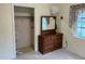 Bedroom featuring closet space, a dresser, and a window with curtains at 617 Vandenberg St, Altamonte Springs, FL 32701
