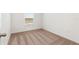 Minimal bedroom with neutral carpet and a window at 1794 White Elephant Loop, Winter Haven, FL 33884