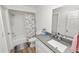 Bathroom featuring shower and tub combo, modern vanity, and neutral paint at 2937 Delrose N Dr, Lakeland, FL 33805