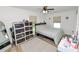 Comfortable bedroom with large windows, closet space, and modern accents at 2937 Delrose N Dr, Lakeland, FL 33805
