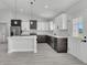 Well-lit kitchen featuring stainless steel appliances and a stylish design with an open layout at 12921 Sw 64Th Terr Rd, Ocala, FL 34473