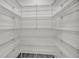 Spacious pantry with ample wire shelving for organized storage at 12921 Sw 64Th Terr Rd, Ocala, FL 34473