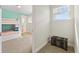 Cozy bedroom featuring a bunk bed and a decorative wooden chest with an open concept view of another bedroom at 321 Auburn Ave, Kissimmee, FL 34747
