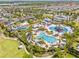 Aerial view of the community's water park, pools, and recreational amenities at 321 Auburn Ave, Kissimmee, FL 34747