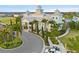Elegant clubhouse with palm trees and manicured landscaping for community gatherings and recreation at 321 Auburn Ave, Kissimmee, FL 34747