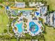 Aerial view of waterpark featuring water slides, pools, and recreation areas at 321 Auburn Ave, Kissimmee, FL 34747