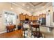 Kitchen with breakfast bar seating, custom cabinets and stainless steel appliances at 5144 Riverlake Dr, Bartow, FL 33830