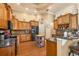 Spacious eat-in kitchen with a center island, custom cabinets, and stainless steel appliances at 5144 Riverlake Dr, Bartow, FL 33830